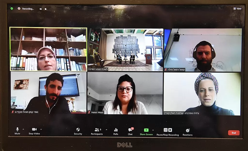 A zoom call showing six participants talking to each other.